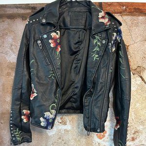 BLANKNYC black leather motorcycle jacket. Size XS. Embroidery rivets moto